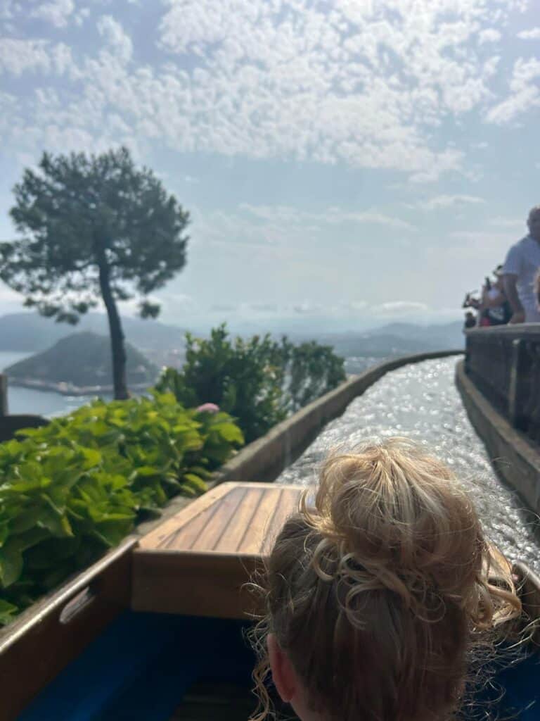 Child riding an attraction at Monte Igueldo amusement park San Sebastián