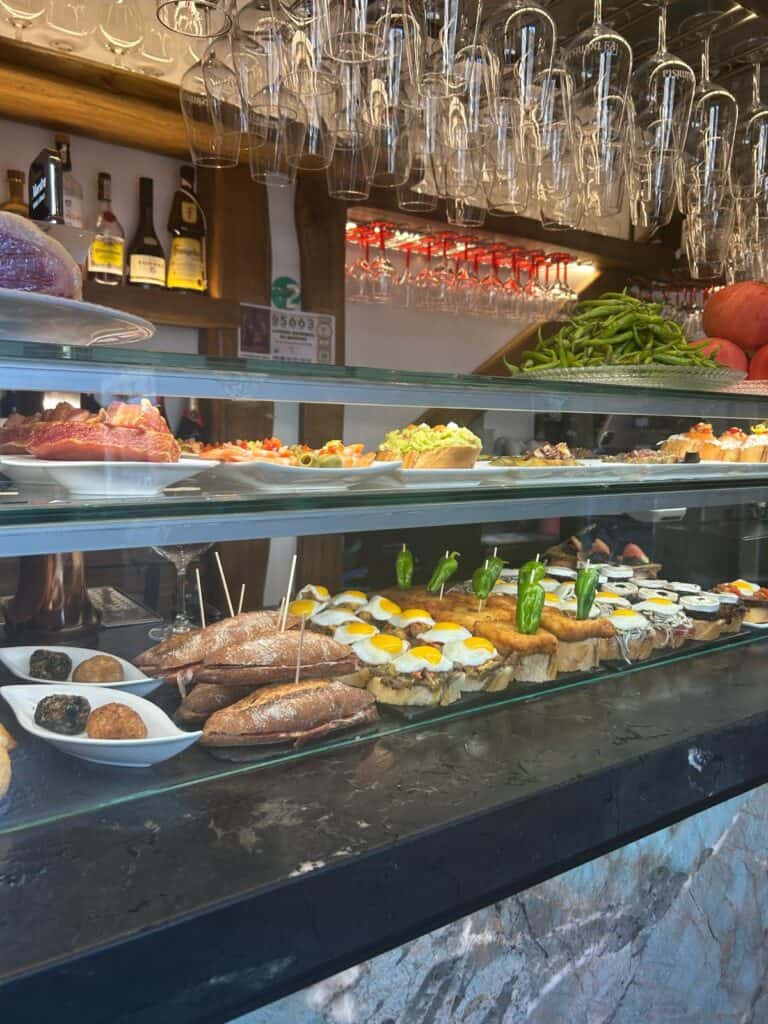 Traditional pintxos displayed on a bar in San Sebastián