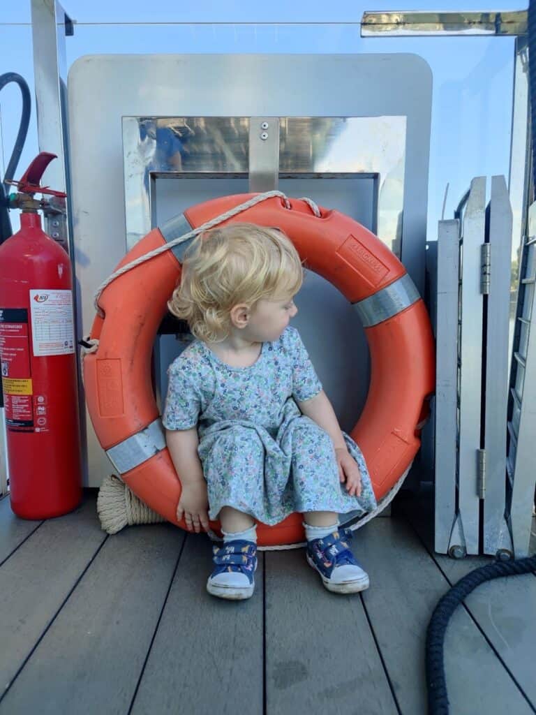 Toddler on a boat trip along the Guadalquivir in Seville